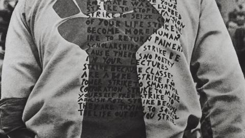Student wearing "8 Demands" shirt