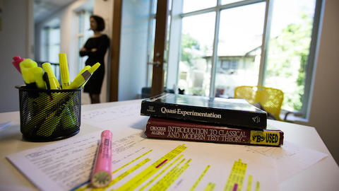 A stack of books on assessment