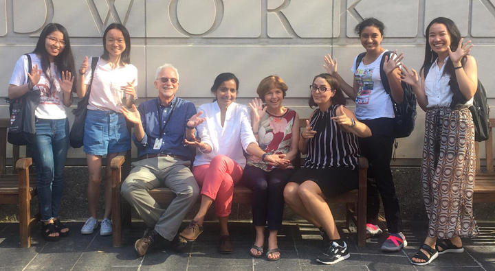 Sarah Emory poses with instructors and students from the Professional Communication Program for New International Students.