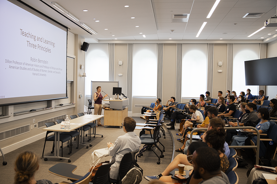Professor Robin Bernstein presents her plenary talk in Harvard Hall.