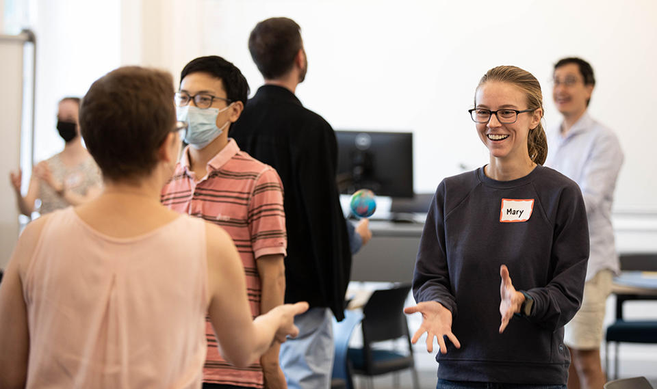 Students toss a ball between them during a communication session at the Fall Teaching Conference.